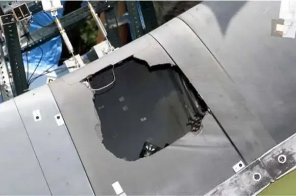 Photograph of a sample of space shuttle wing leading edge following an experimental foam strike at the Southwest Research Institute. It's a good example of why incoming space vehicles need to be shielded from the heat of re-entry. Courtesy NASA/SWRI